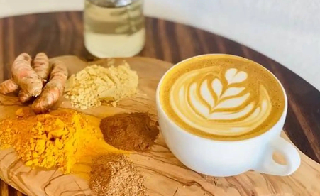 Order Golden Tumeric Latte food online from The Cuppo Coffee & Tea store, Jersey Village on bringmethat.com