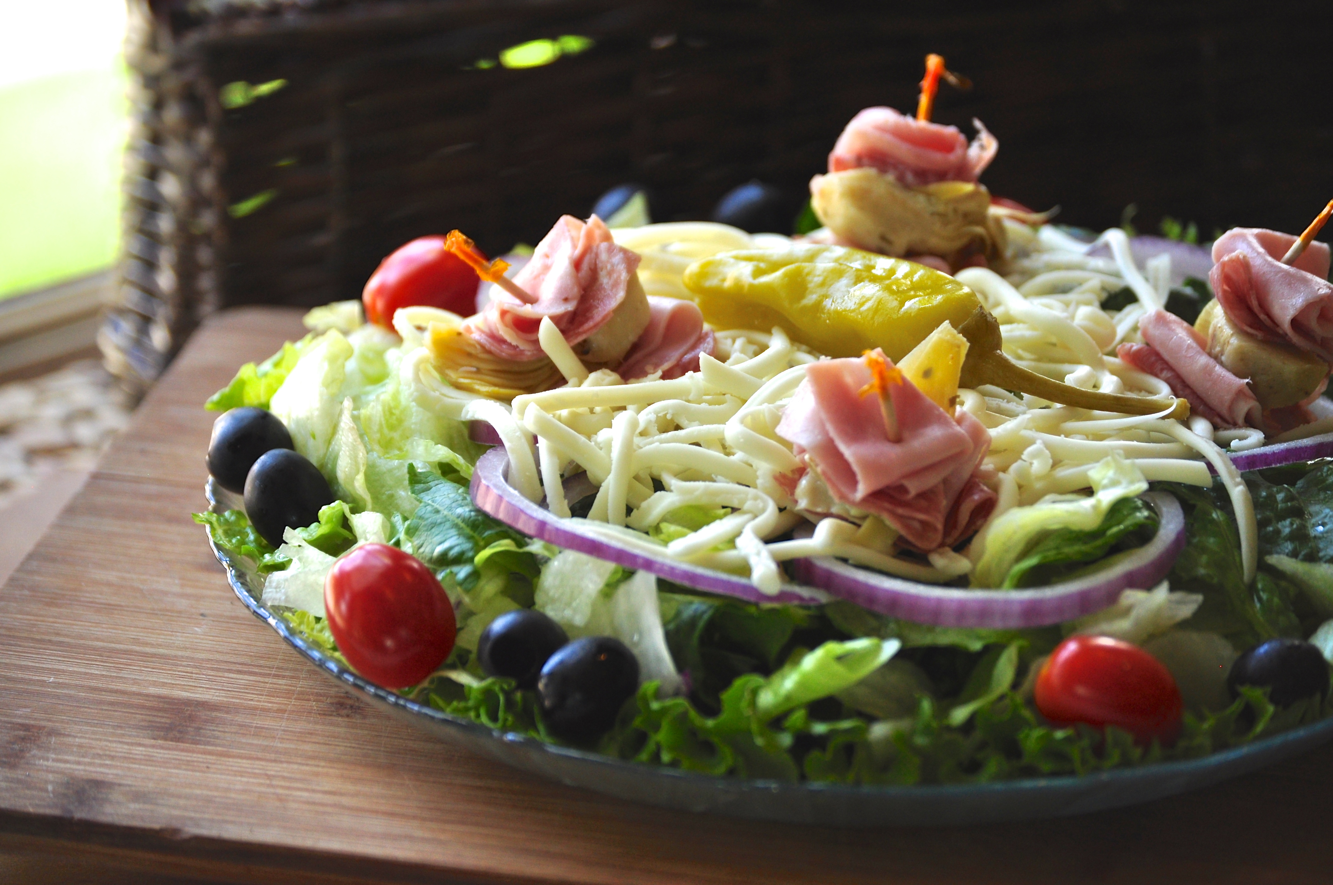 Order Antipasto Salad food online from Upper Crust Pizza store, Oceanside on bringmethat.com