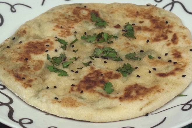 Order Kulcha with Onion food online from Desi Chops store, Louisville on bringmethat.com