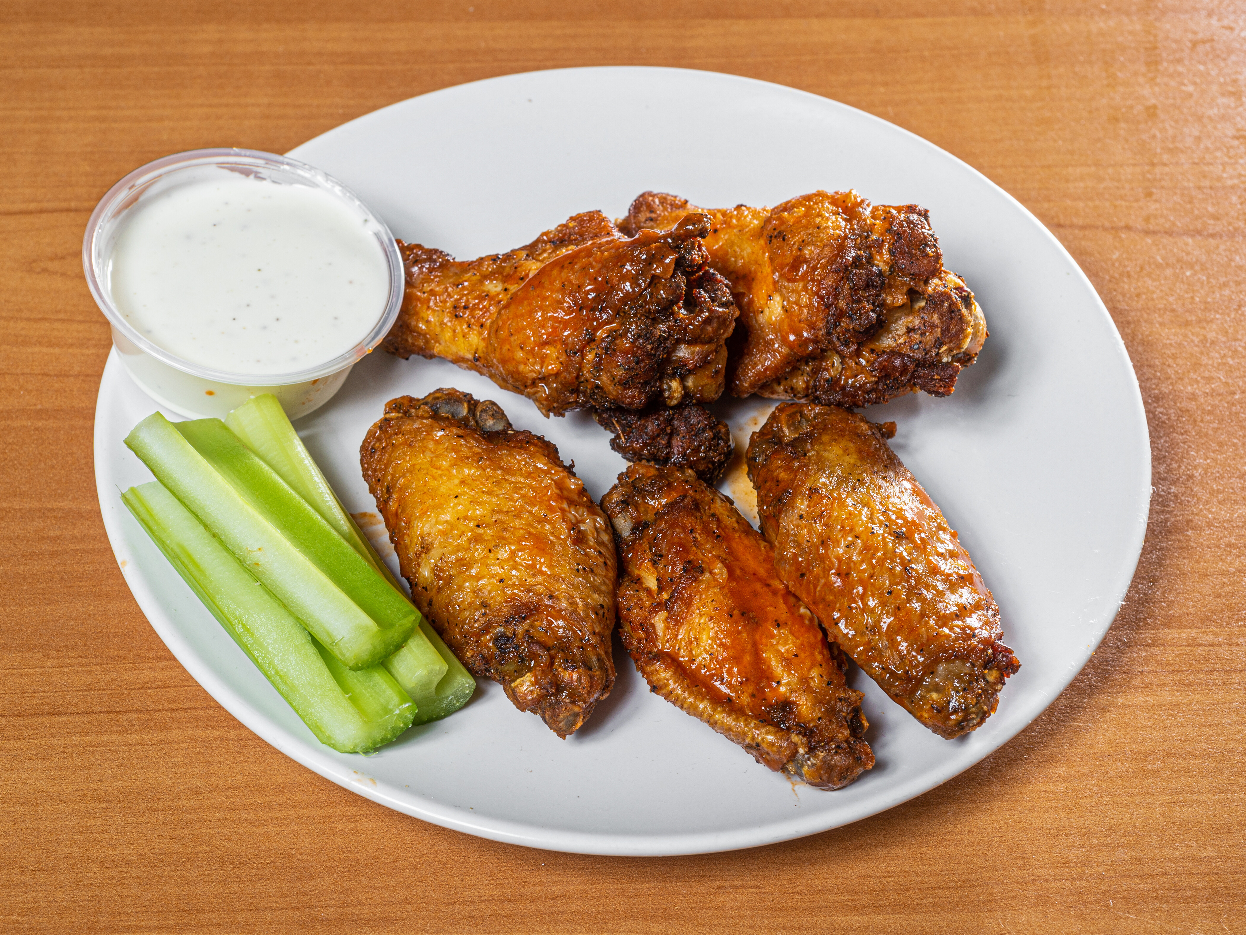 Order Bone in Buffalo Wings food online from Famous Phillys Cheesesteak store, Clayton on bringmethat.com