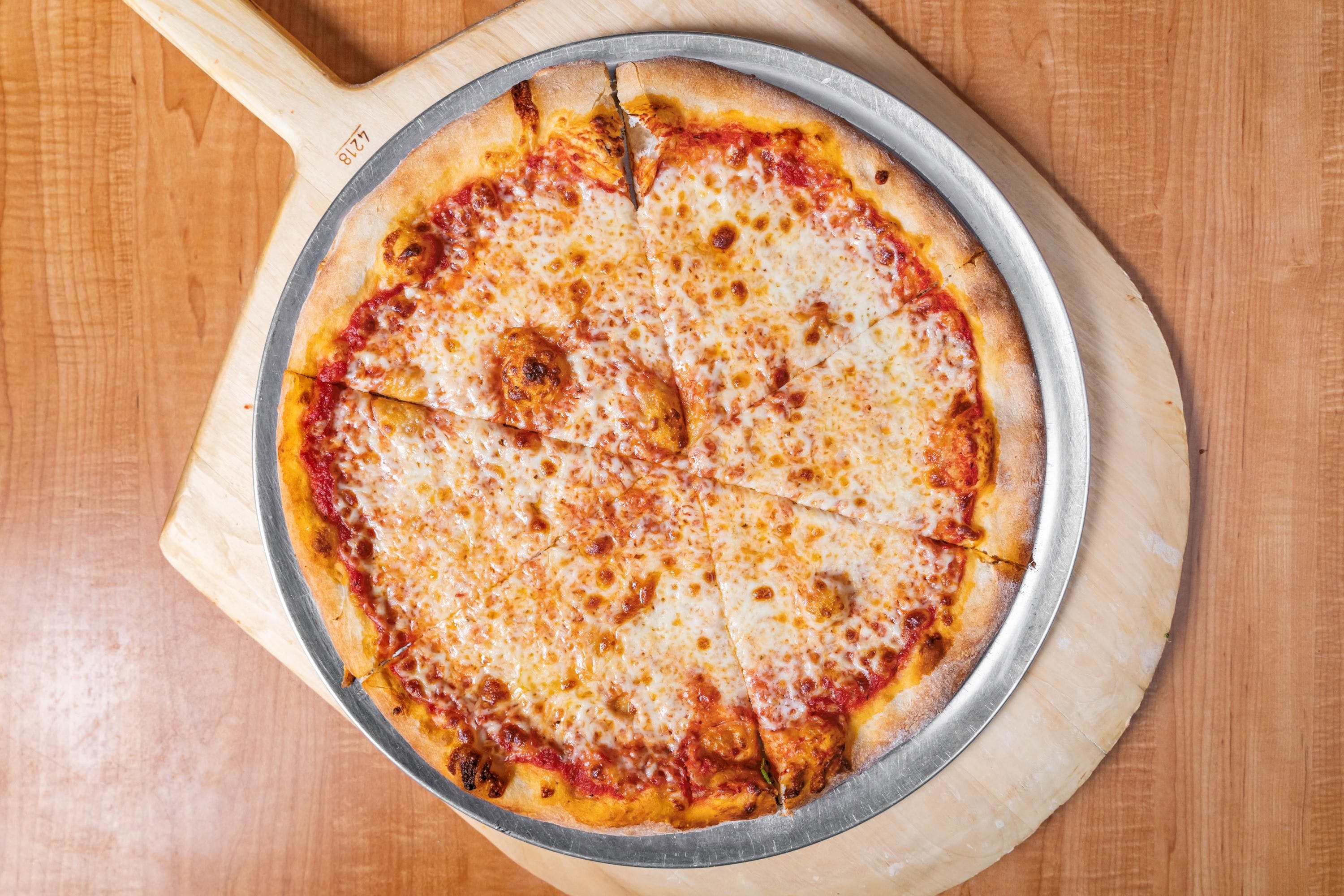 Order Cheese Pizza - Personal 10" food online from Luigi Italian Restaurant store, Hondo on bringmethat.com