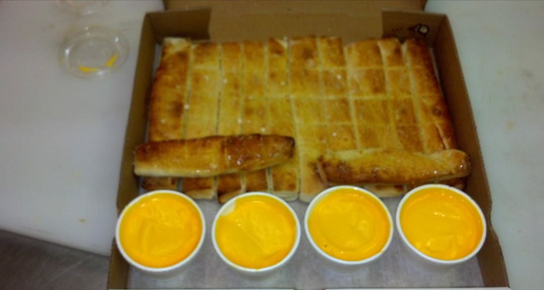 Order Bread Sticks - 6 Pieces food online from Big D Pizza store, Clyde on bringmethat.com