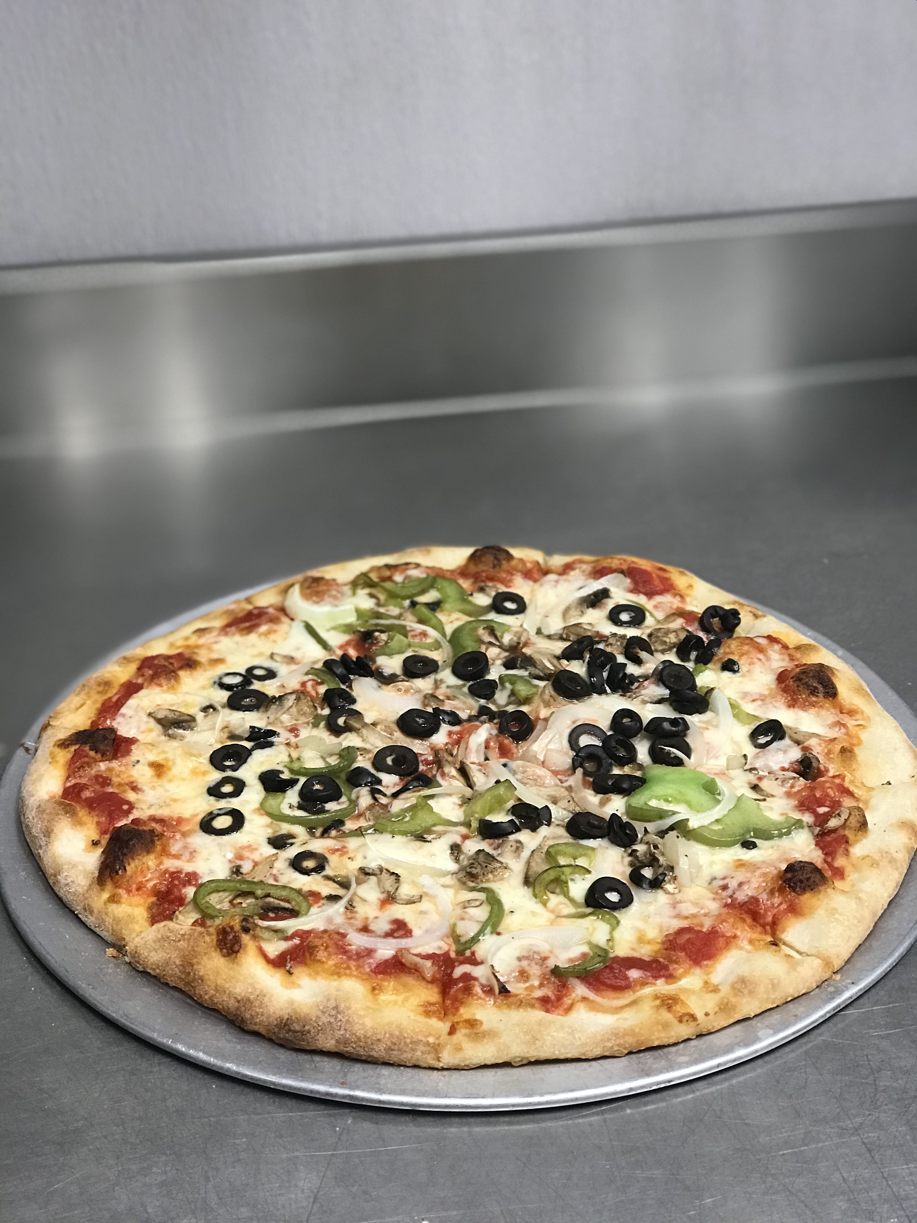 Order Veggie Pizza food online from Johnny's Pizza store, Cary on bringmethat.com