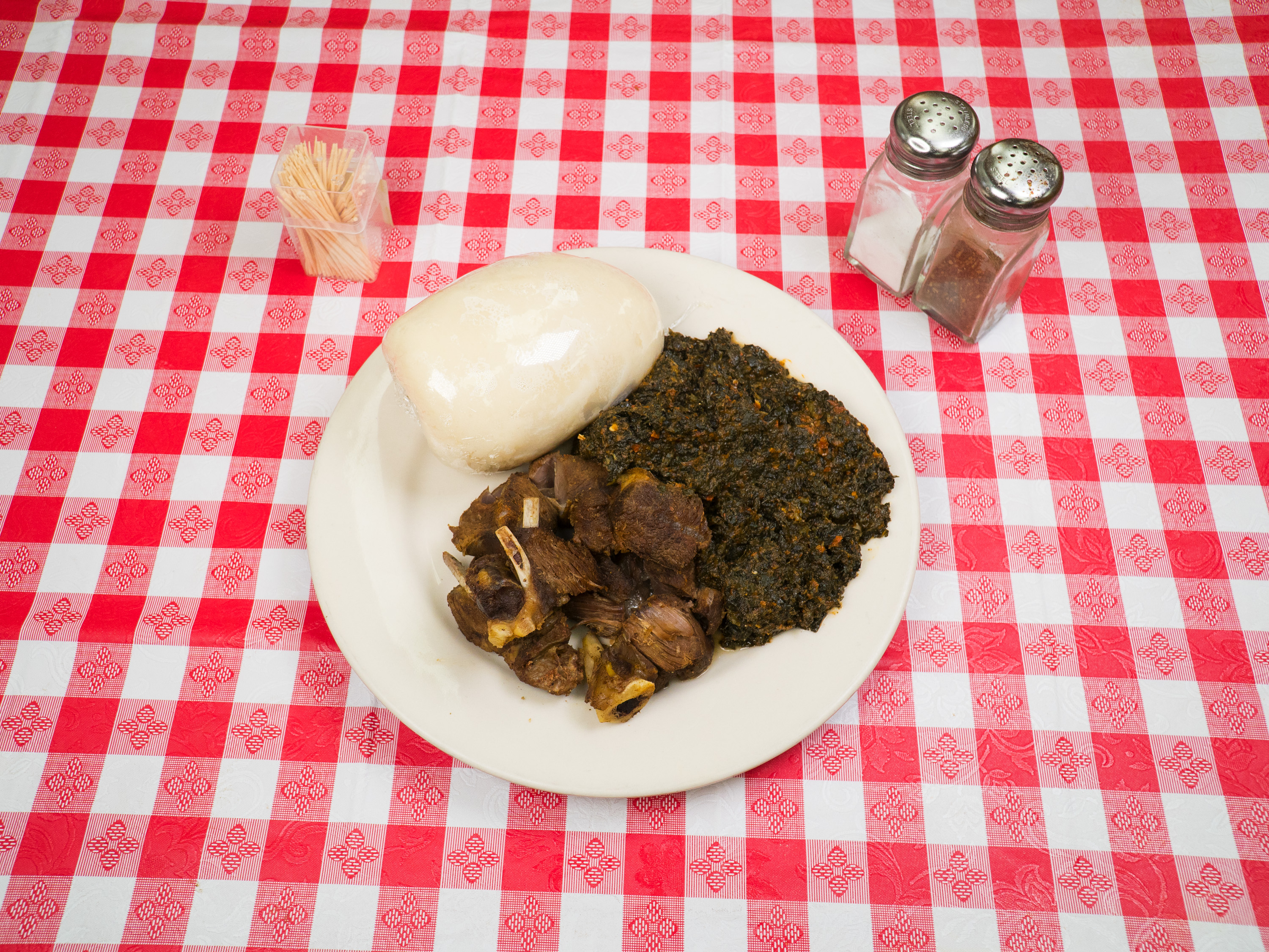 Order Bitter Leaf Soup food online from Jodeem African Cuisine store, Greenbelt on bringmethat.com
