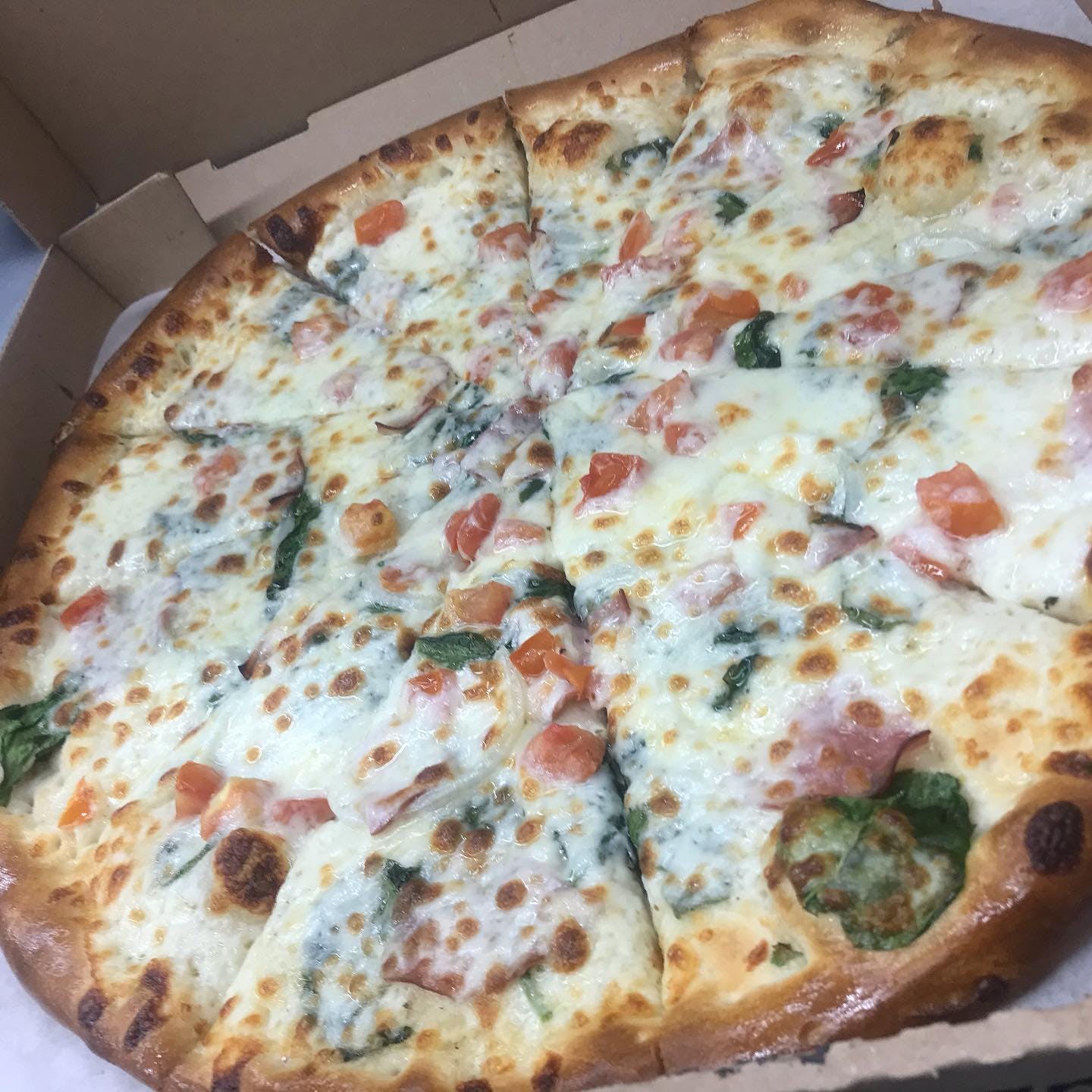 Order Spinach & Garlic Pizza - Small 10" food online from Firestone Pizza store, Houston on bringmethat.com