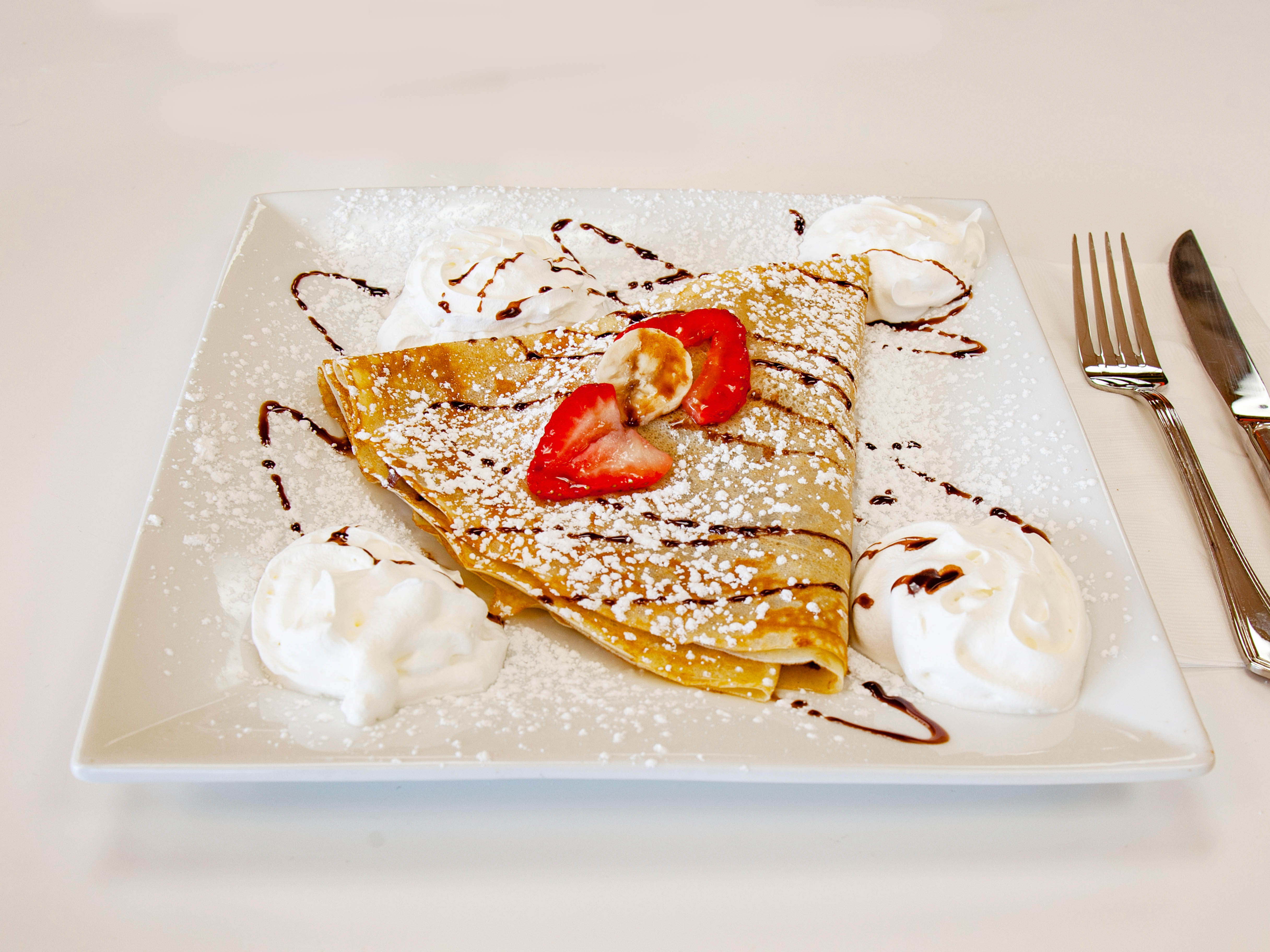 Order Nutella and Strawberry Crepe food online from Crepe Heaven store, Lawndale on bringmethat.com