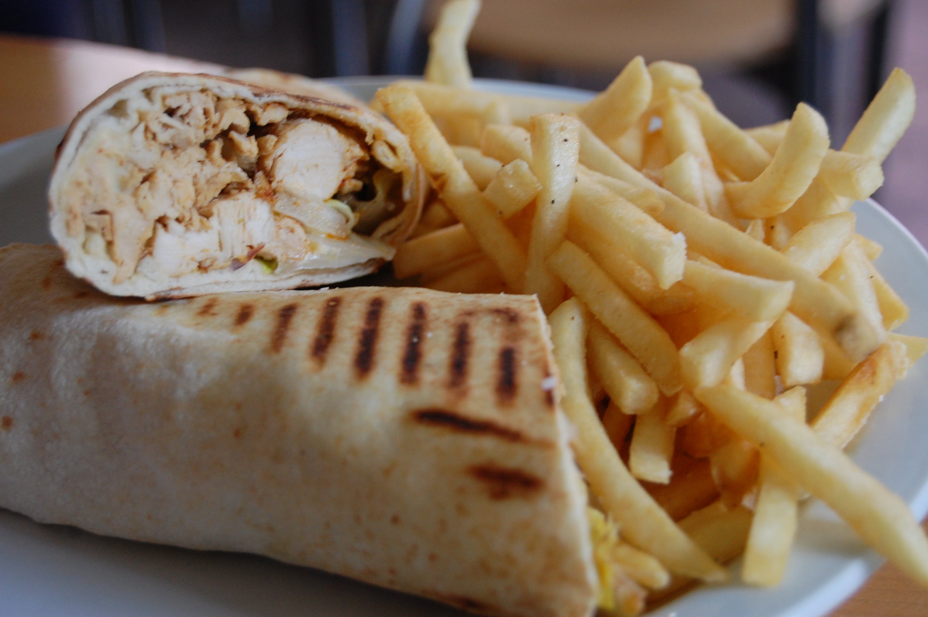 Order Grilled Chicken Wrap - Wrap food online from Amigos Restaurant & Pizza store, Cheltenham on bringmethat.com