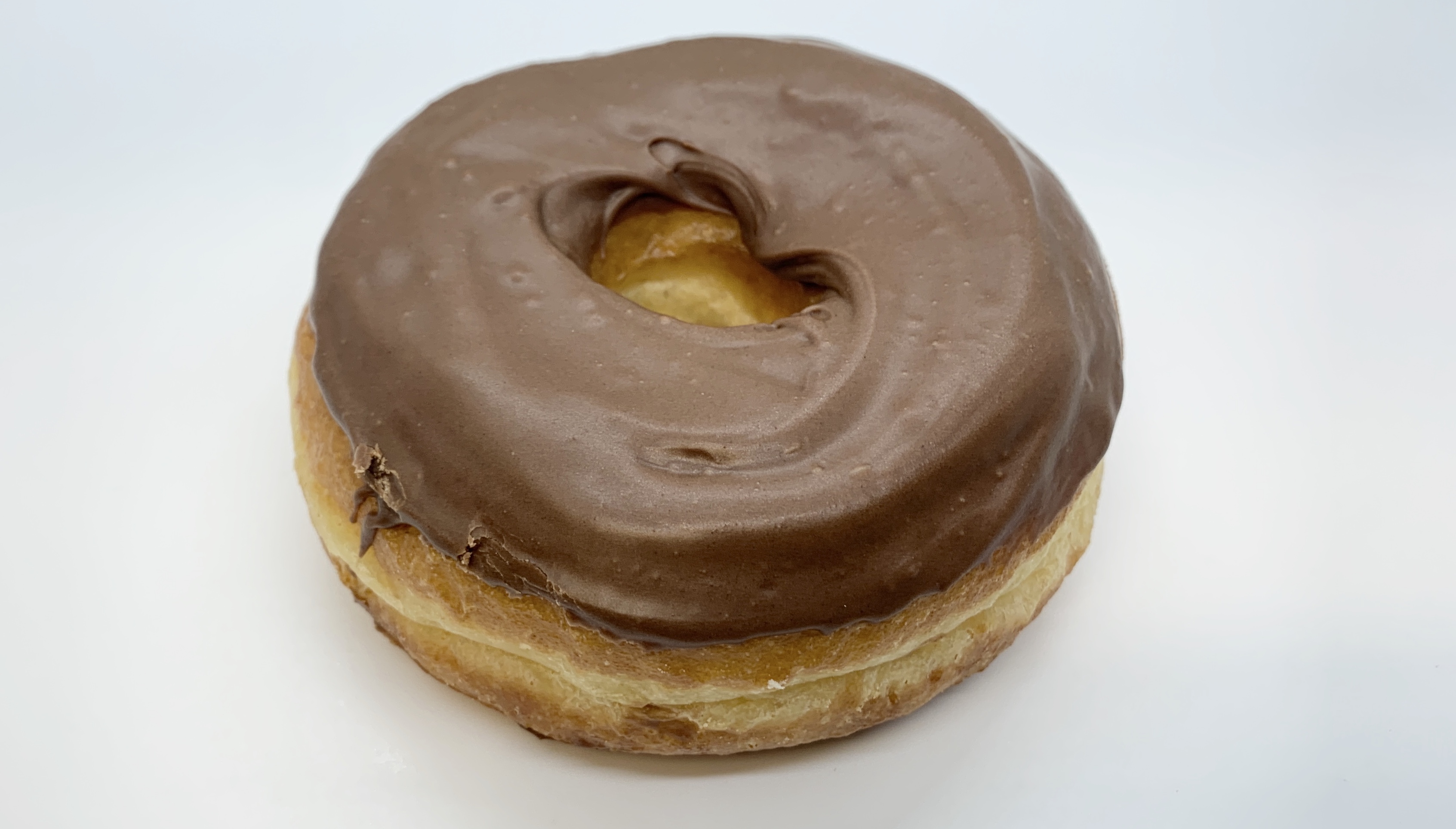 Order Raised Chocolate Icing Donut food online from Star Donuts store, Medford on bringmethat.com