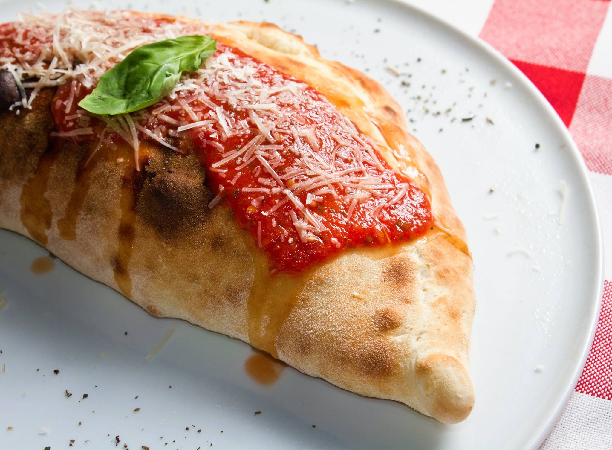 Order Calzone with One Topping - Calzone food online from Mario's Famous Pizza store, Elizabeth on bringmethat.com