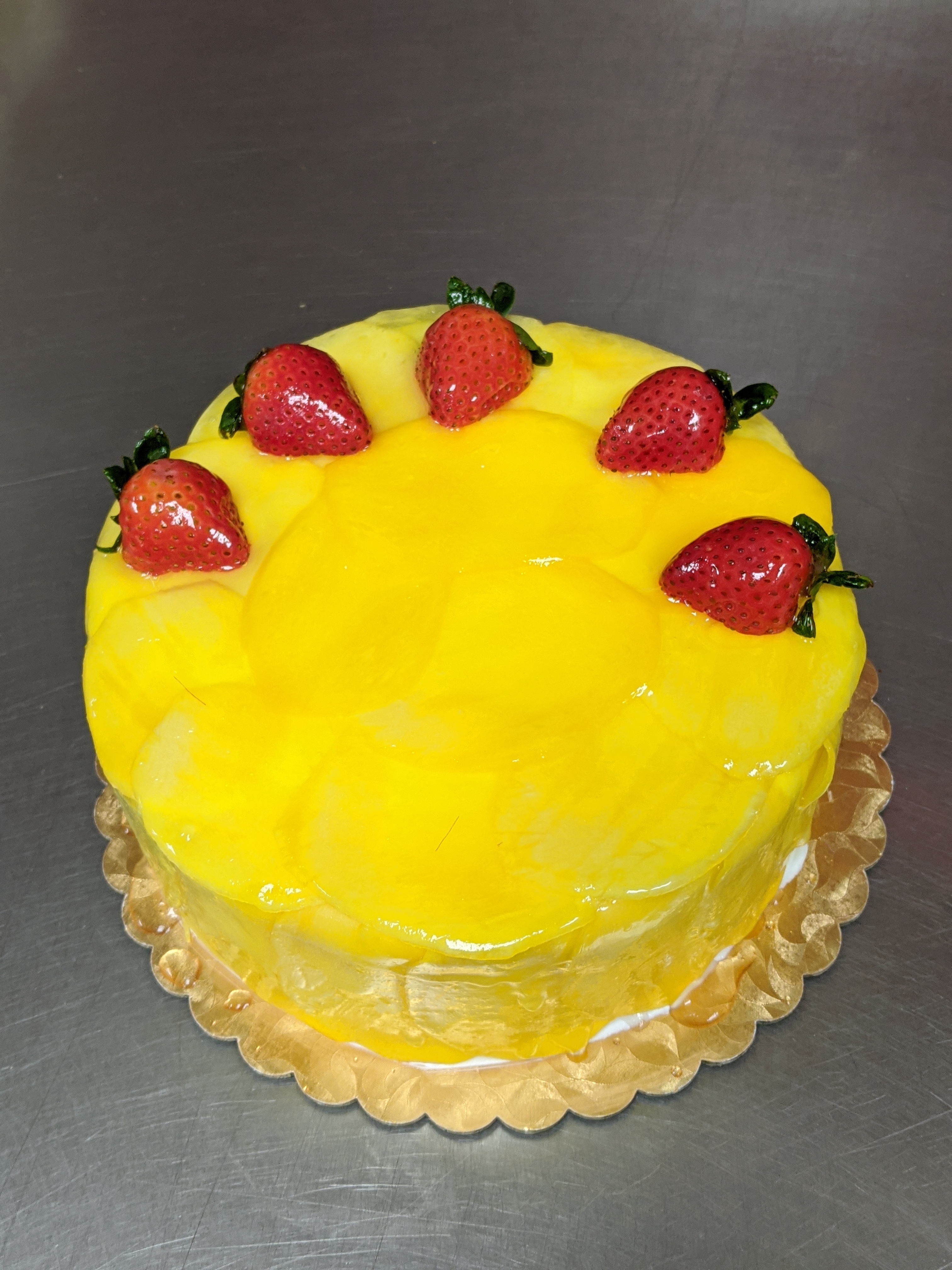 Order Whole  8" mango  cake food online from Olympic Bakery store, Temple City on bringmethat.com