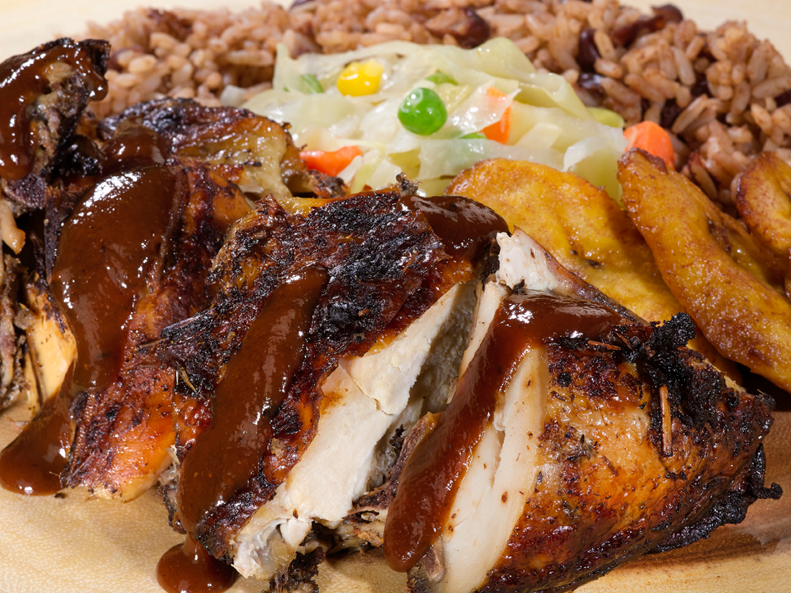 Order Jerk Chicken food online from Golden Krust Caribbean Restaurant store, Austell on bringmethat.com