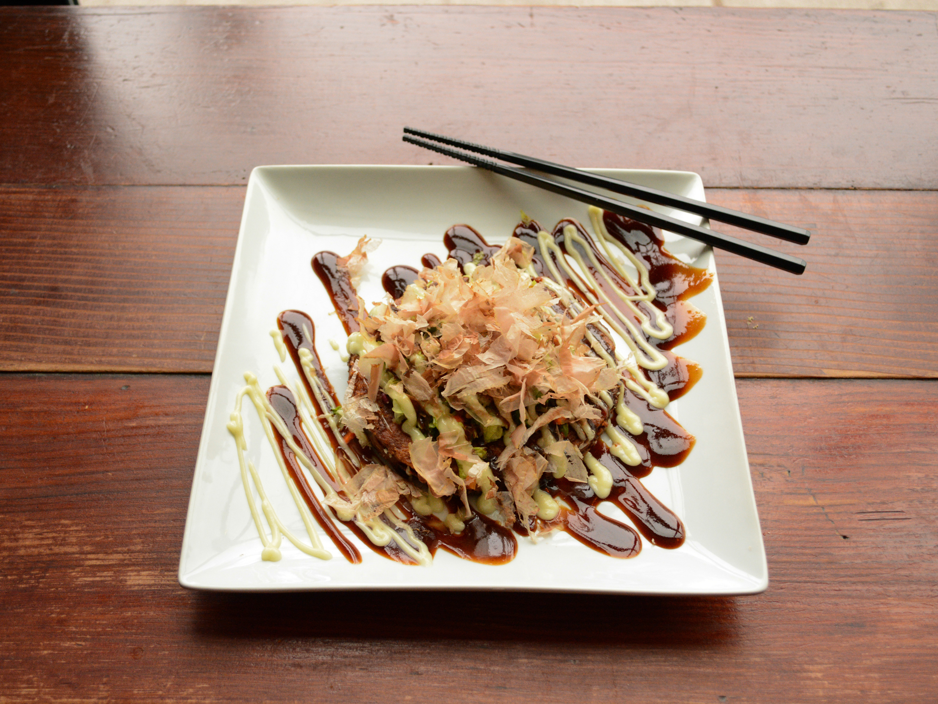 Order Okonomiyaki Plate food online from Nuna Ramen store, Seattle on bringmethat.com