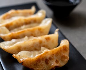 Order 18. Gyoza (Potstickers) food online from Bangkok Thai Cuisine store, Dover on bringmethat.com