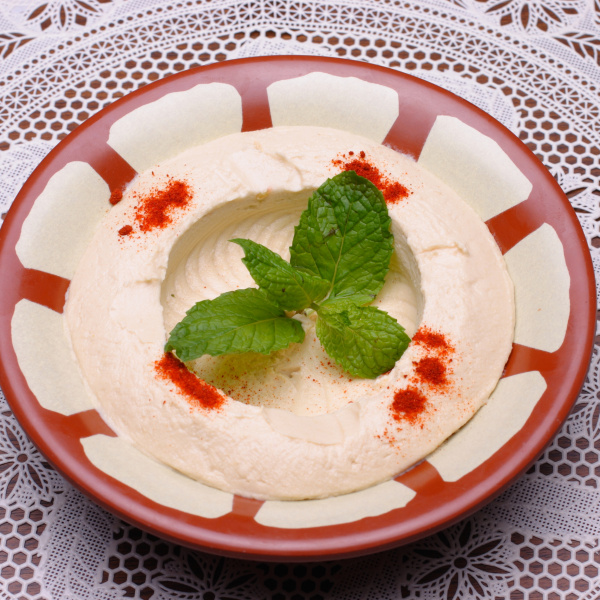 Order Hummus and 5 Grape Leaves food online from Shawarmaholic store, Toledo on bringmethat.com