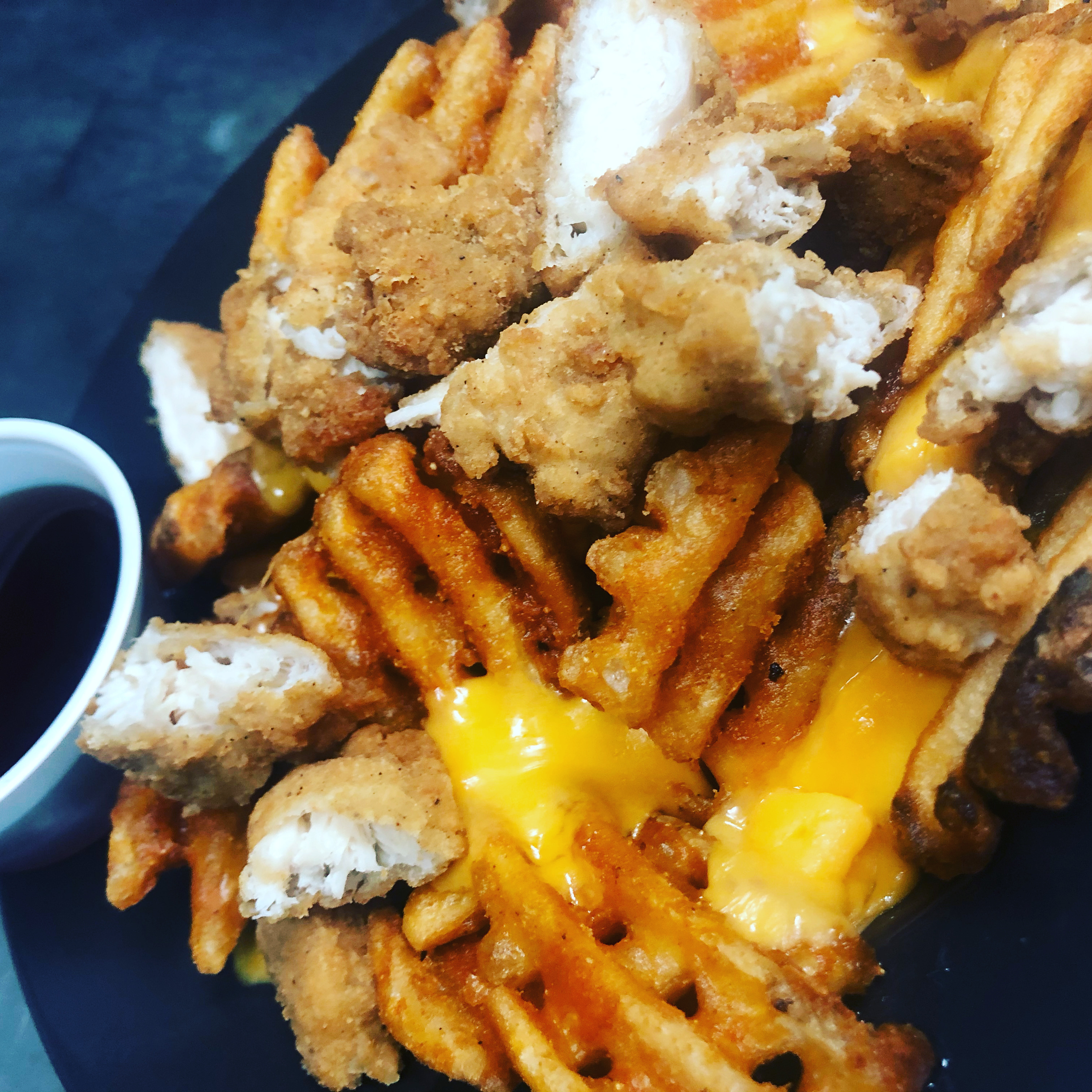 Order Chicken & Waffles Poutine food online from Liberty Bar & Poutinerie store, Pontiac, MI on bringmethat.com