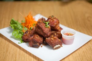 Order 40. Riblets food online from Thai Wok-In & Go store, Dallas on bringmethat.com