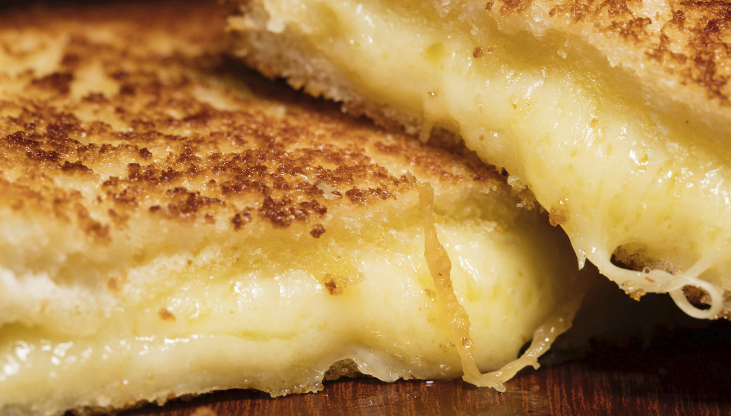 Order Gooey Grill Cheese: Cheddar, Mozzarella, Gruyere & Parmesan Cheeses food online from Crave Bakery And Bar store, Chesapeake on bringmethat.com
