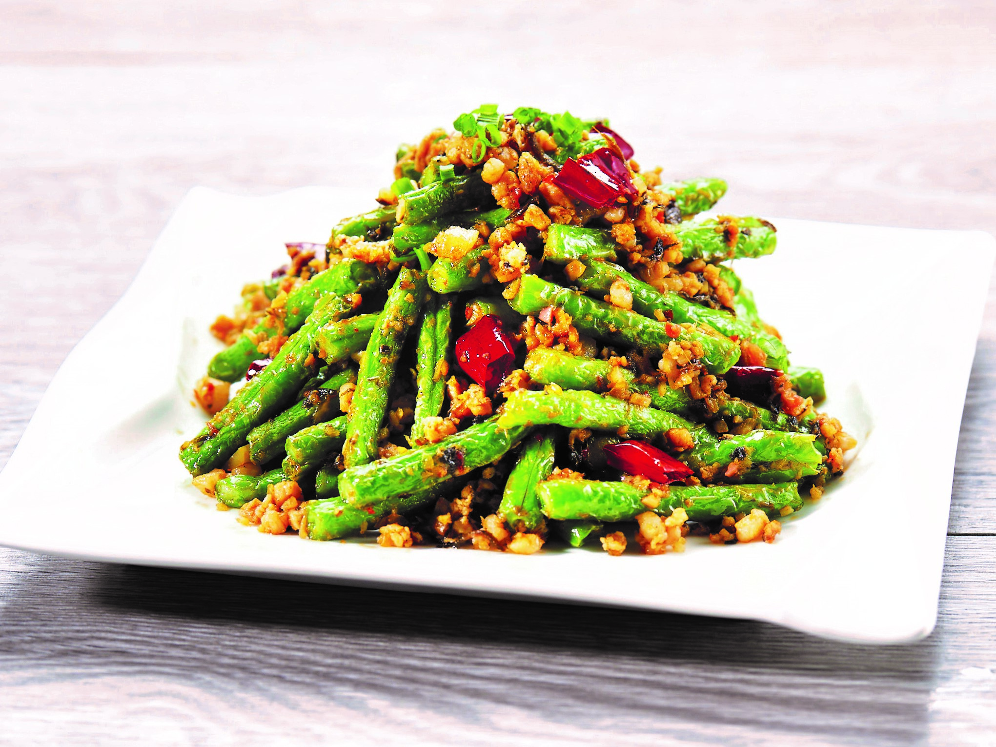Order E9. Stir-Fried French Bean with Minced Pork and Preserved Olive Vegetable food online from Paradise Dynasty store, Costa Mesa on bringmethat.com
