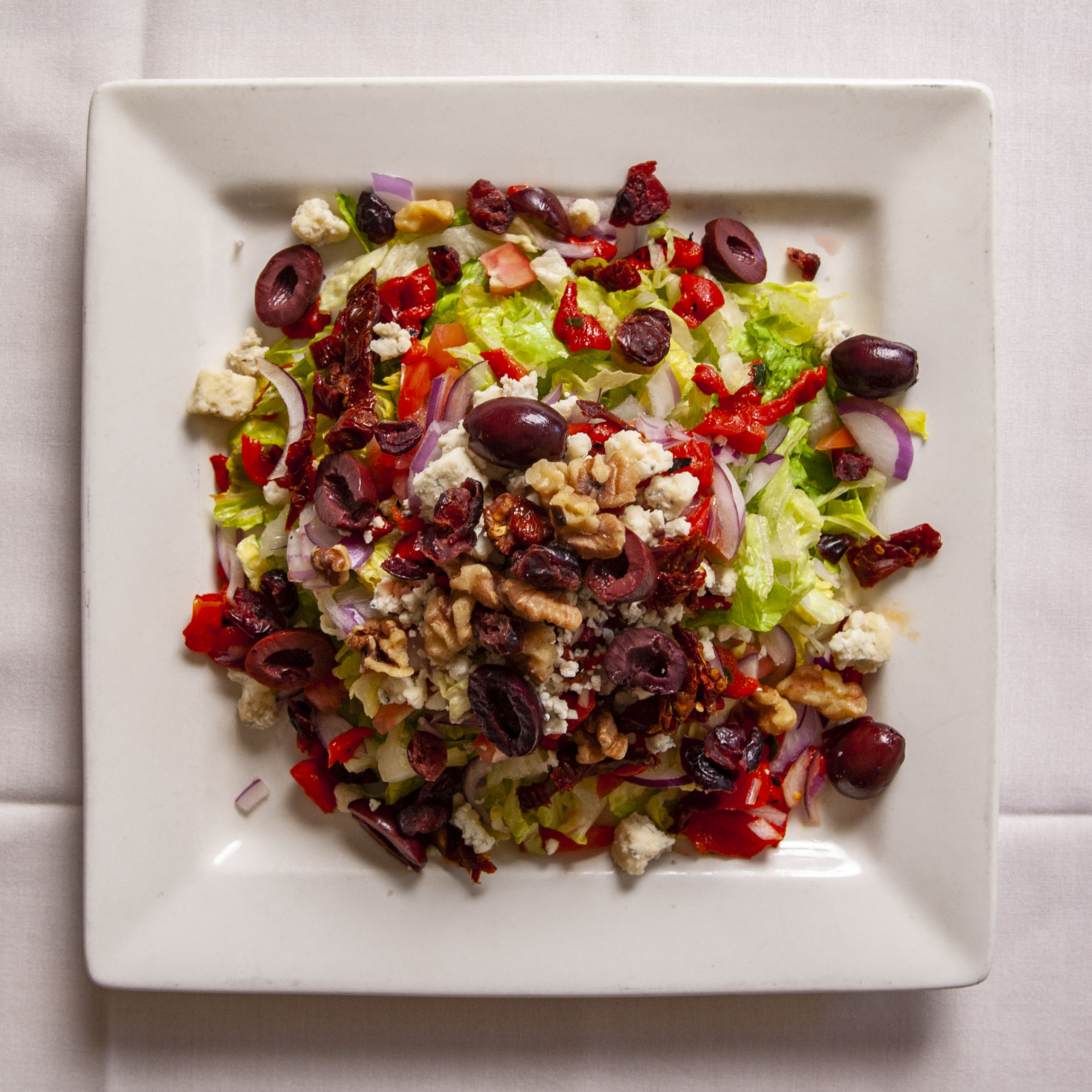 Order Chopped Salad  food online from Que Pasta Italian Gourmet Deli store, Saddle Brook on bringmethat.com