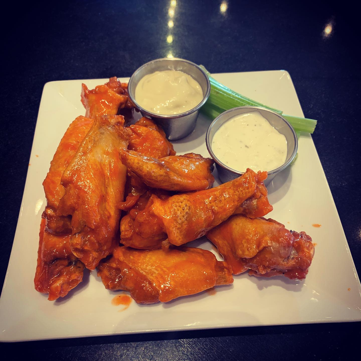 Order Chicken Wings food online from 2 Penguins Tap And Grill store, Centennial on bringmethat.com