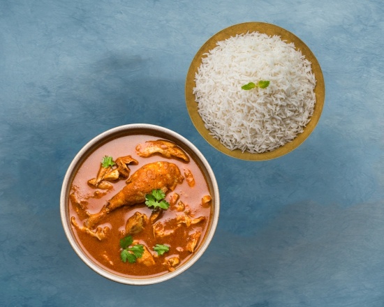 Order Railway Chicken Curry & Aromatic Basmati Rice food online from Gunpowder Cafe store, Exton on bringmethat.com