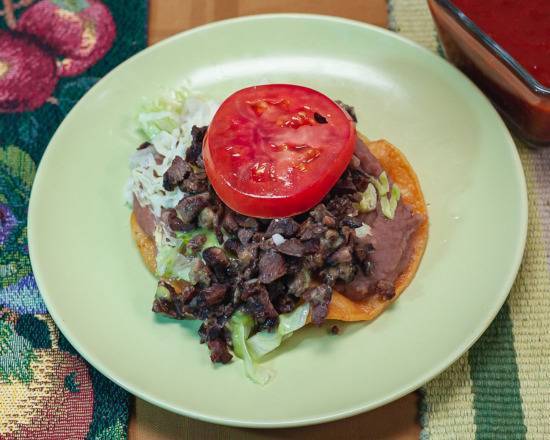 Order Tostada with Meat food online from El Indio Mexicano Restaurant store, Los Angeles on bringmethat.com