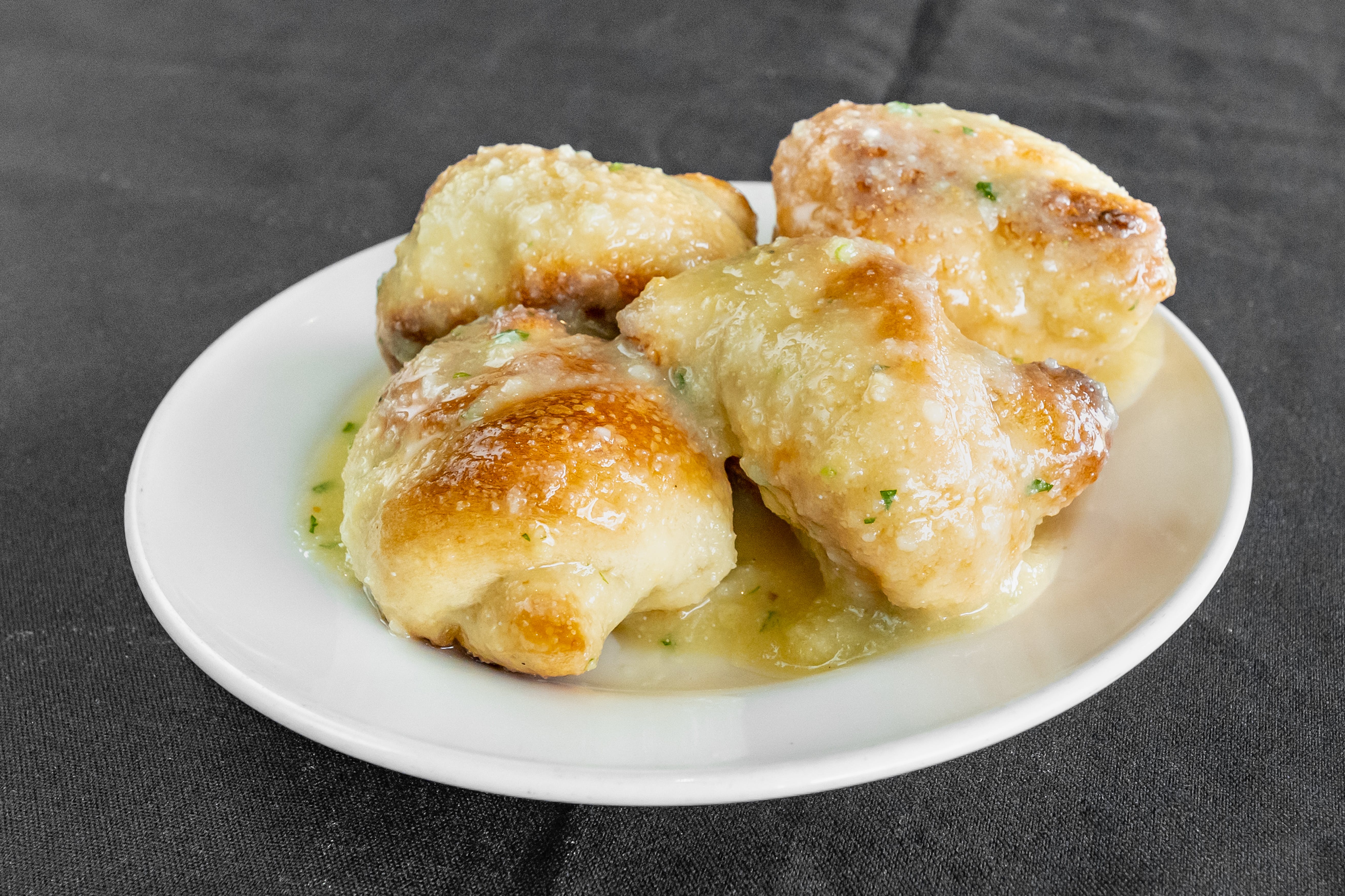 Order Garlic Knots - 4 Pieces food online from Pizza Plaza Of Warminster store, Warminster on bringmethat.com