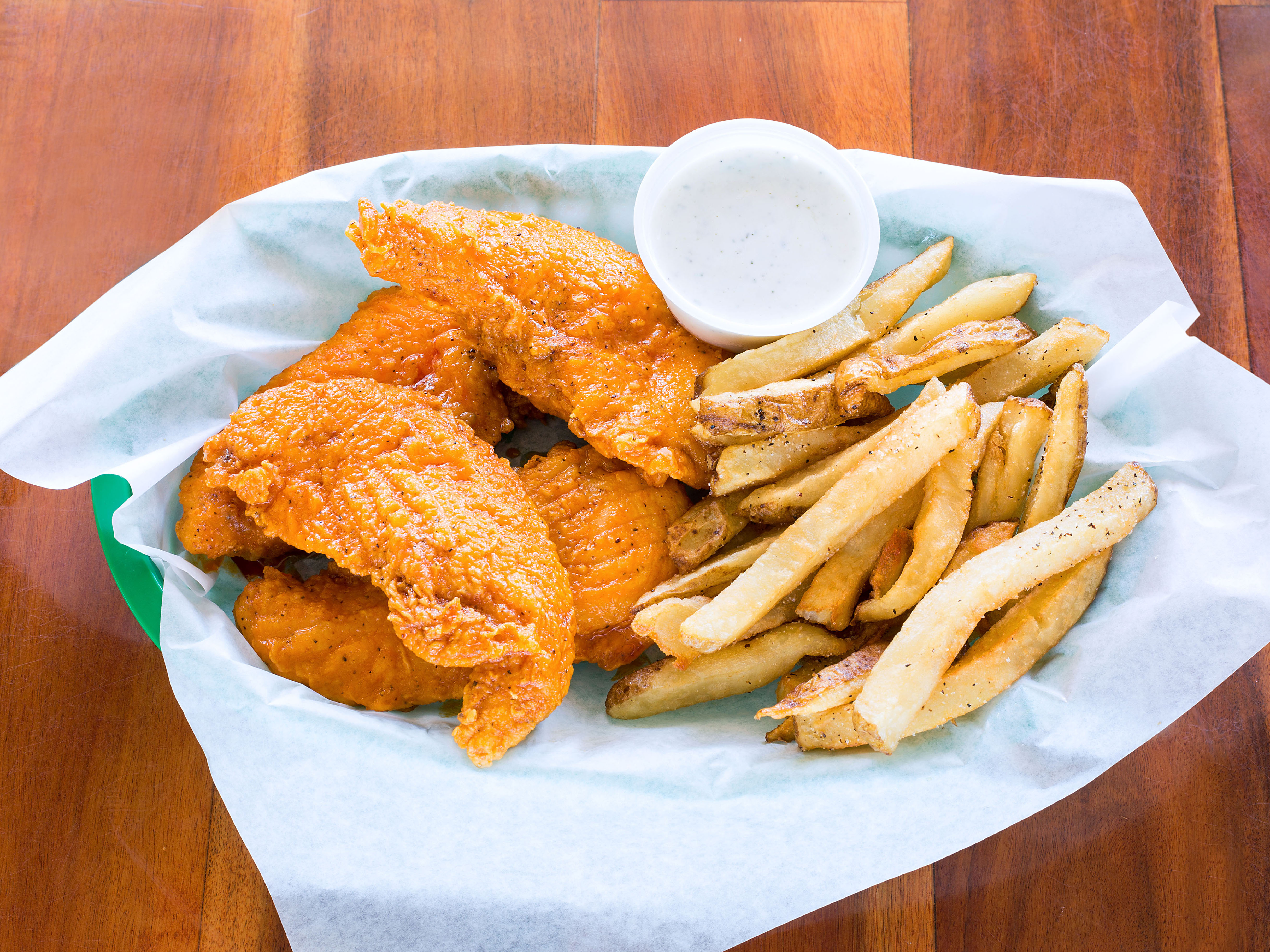 Order 4 Spicy Tender Strips food online from Babe's Old Fashioned Food store, San Antonio on bringmethat.com