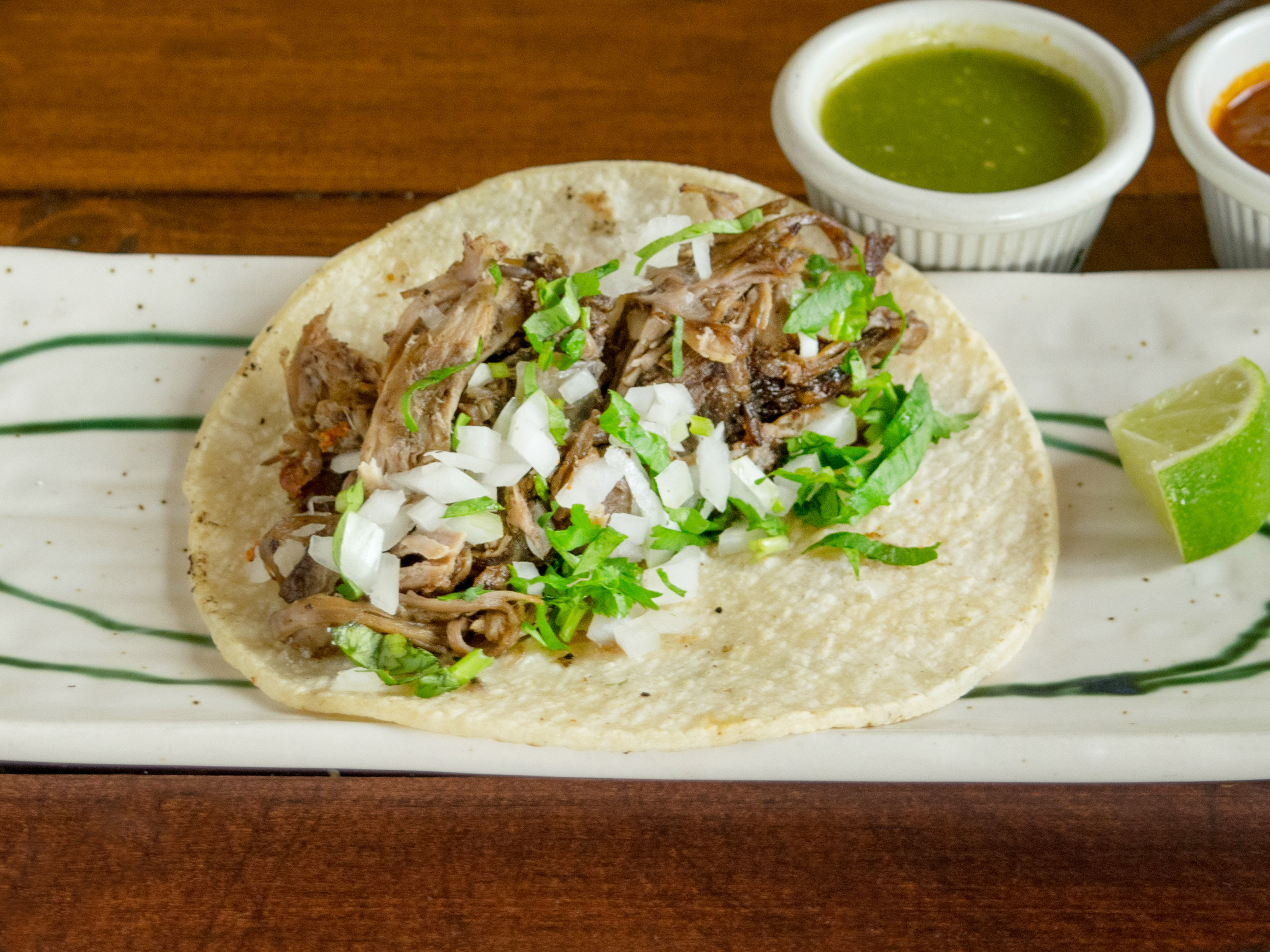 Order Carnitas Grandma’s Recipe food online from Corazon de Cuba Taqueria store, Long Beach on bringmethat.com