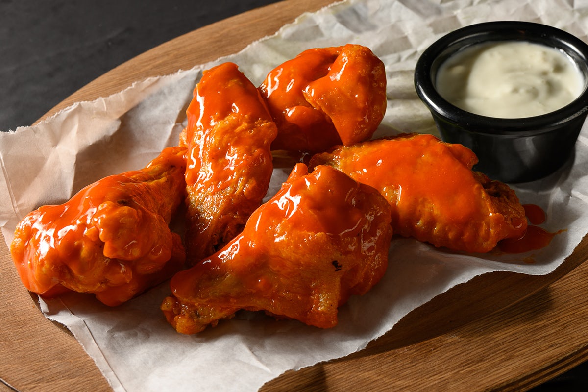 Order 5 Traditional Bone-In Wings food online from Fazoli store, Evansville on bringmethat.com