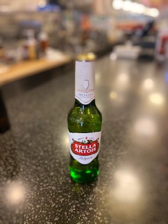 Order Stella Artois food online from 57's all american grill store, Flushing on bringmethat.com