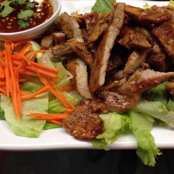 Order Grilled Pork food online from Chao Doi Thai Restaurant store, Pasadena on bringmethat.com