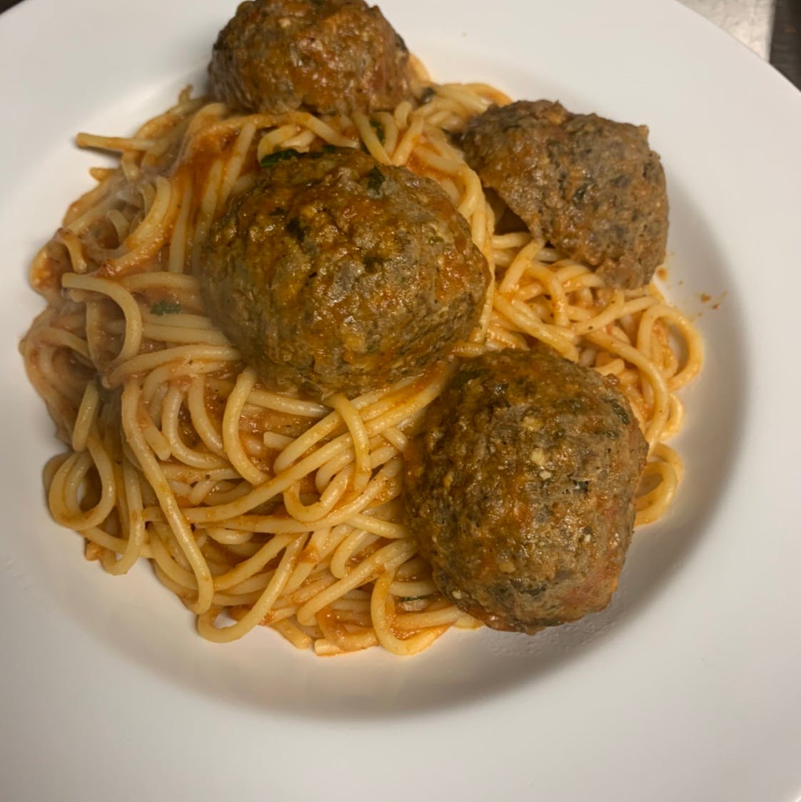 Order Spaghetti with Meatballs - Pasta food online from Taste of Italy Pizzeria store, Corona on bringmethat.com