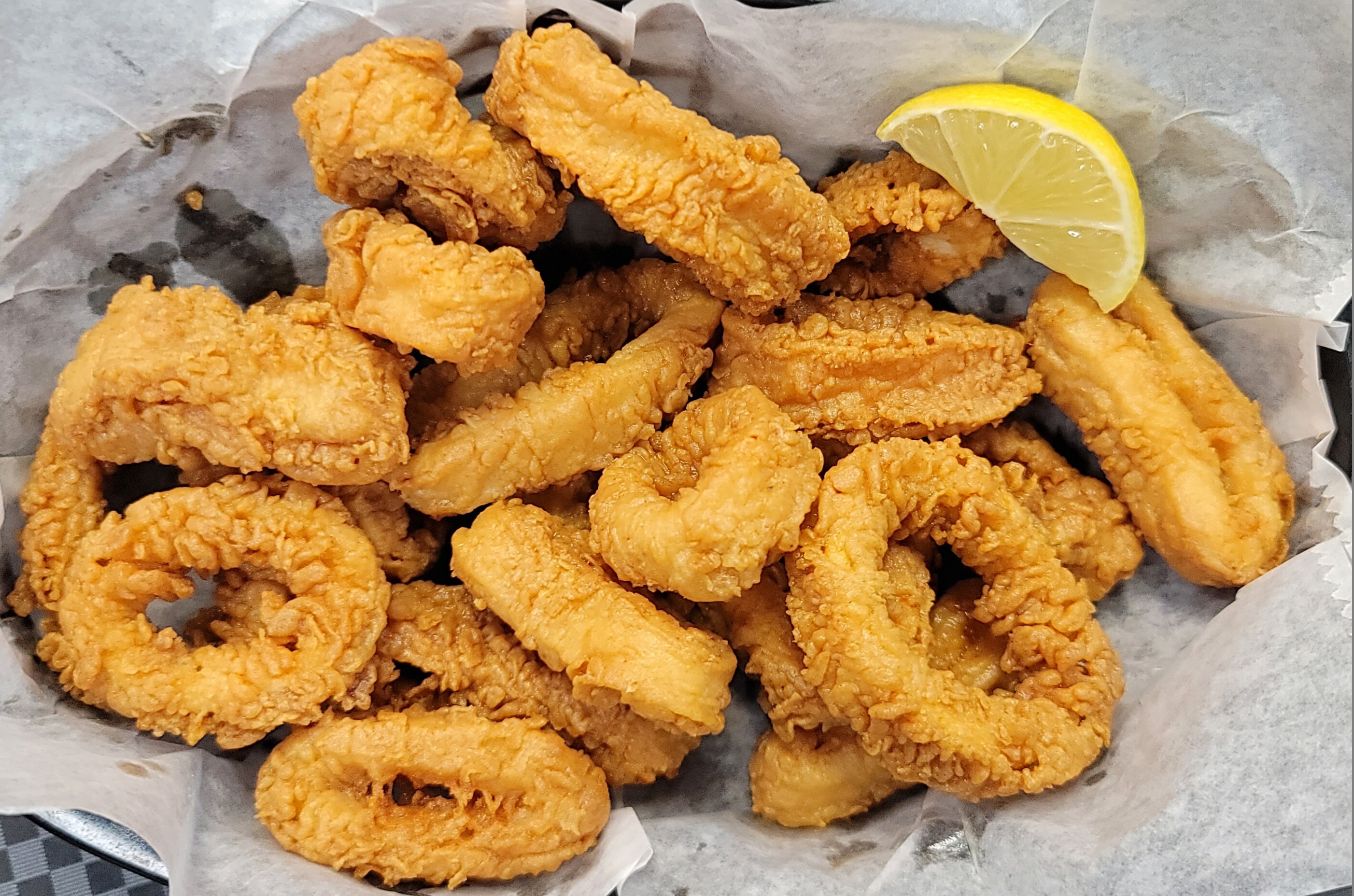 Order A9. Fried Calamari food online from La Juicy Seafood store, O'Fallon on bringmethat.com