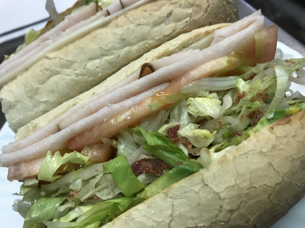 Order Turkey Deluxe Sub food online from Joey's Pizza store, Ontario on bringmethat.com