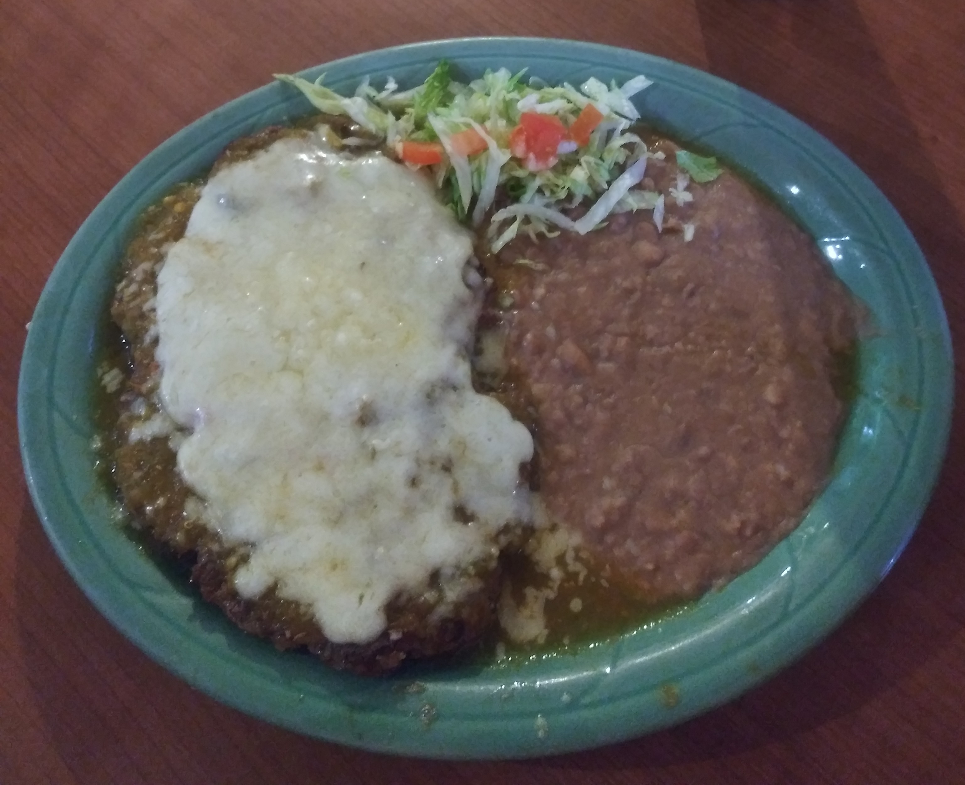 Order 11. Chile con Queso Over a Thick Hamburger Steak food online from G and R Restaurant store, El Paso on bringmethat.com