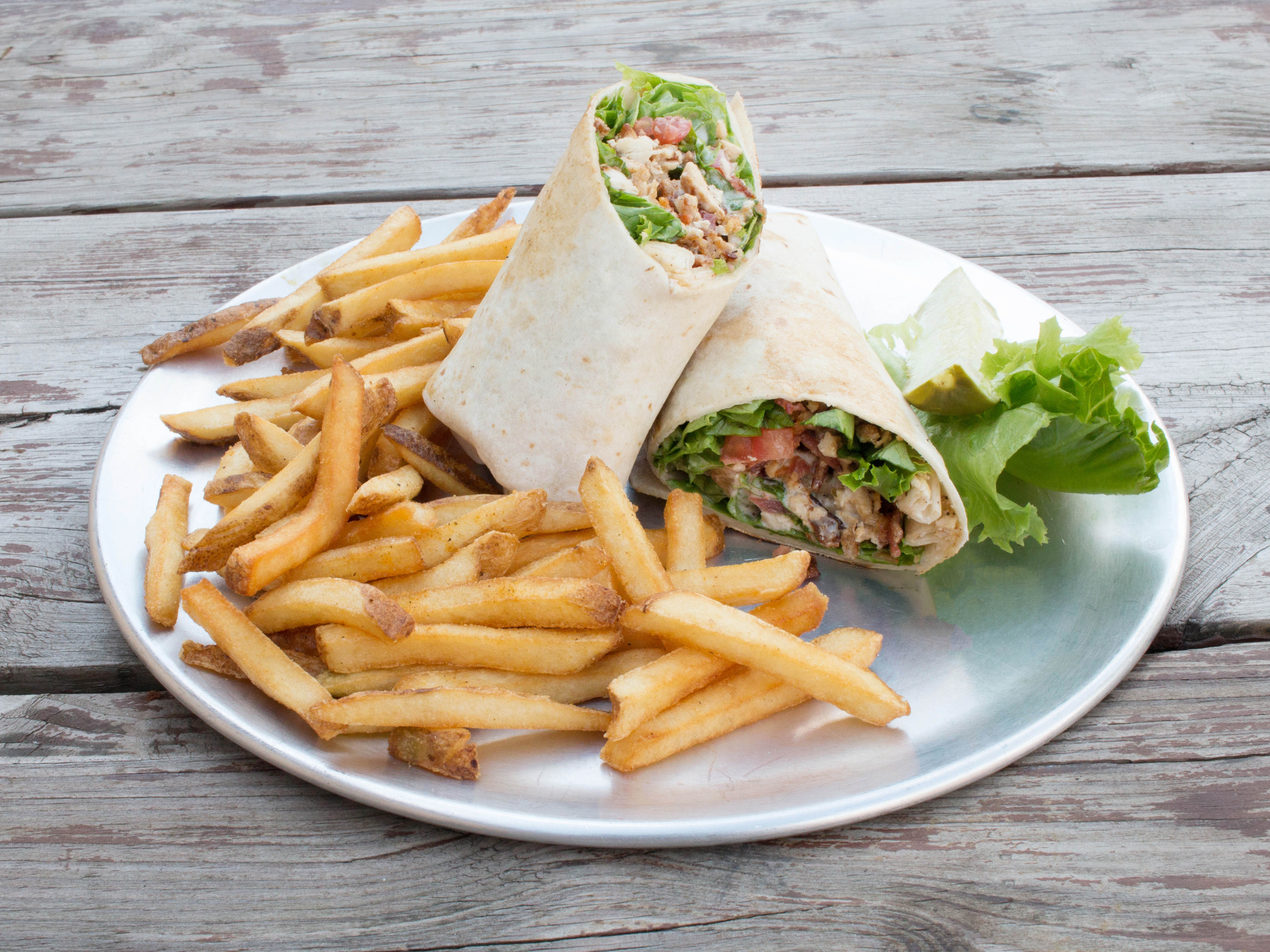 Order Chicken Bacon Ranch Wrap and Fries food online from Biggs Bar & Grill store, Chesterfield on bringmethat.com