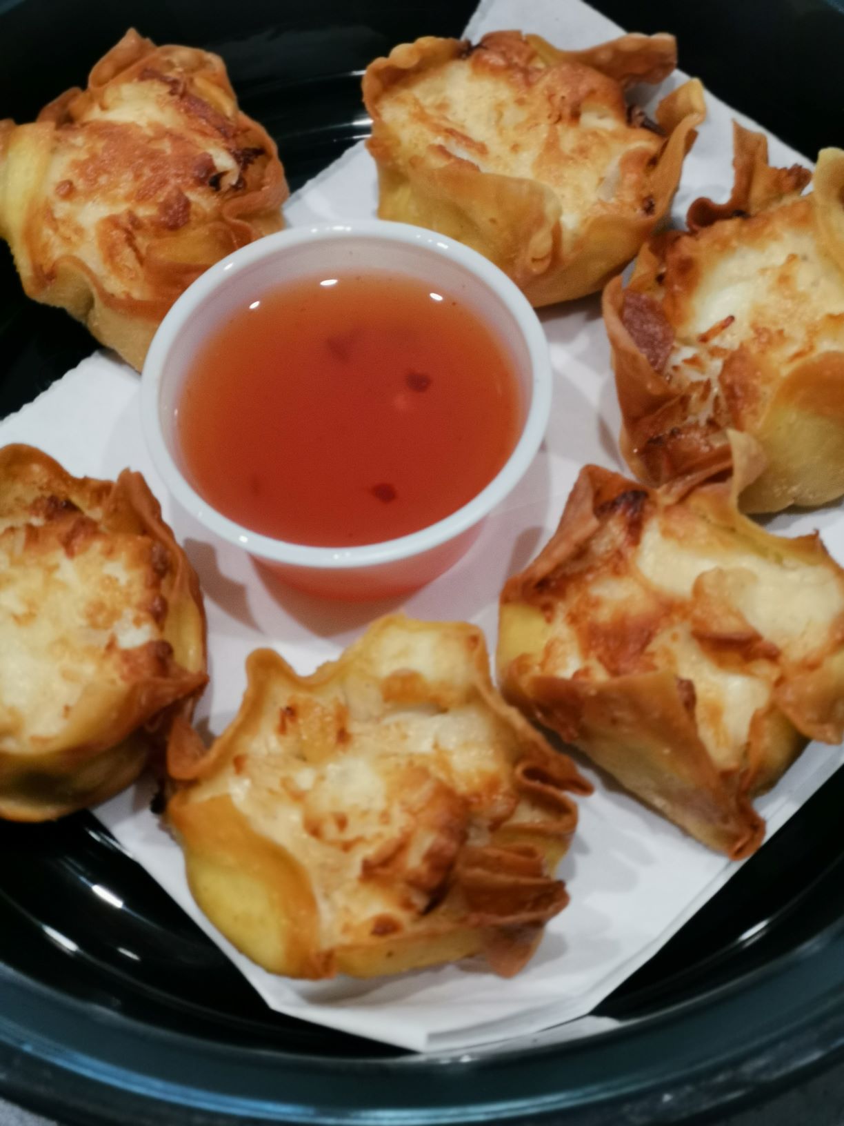Order 9c Crab Rangoons (6) food online from Peppers Thai store, Palm Springs on bringmethat.com