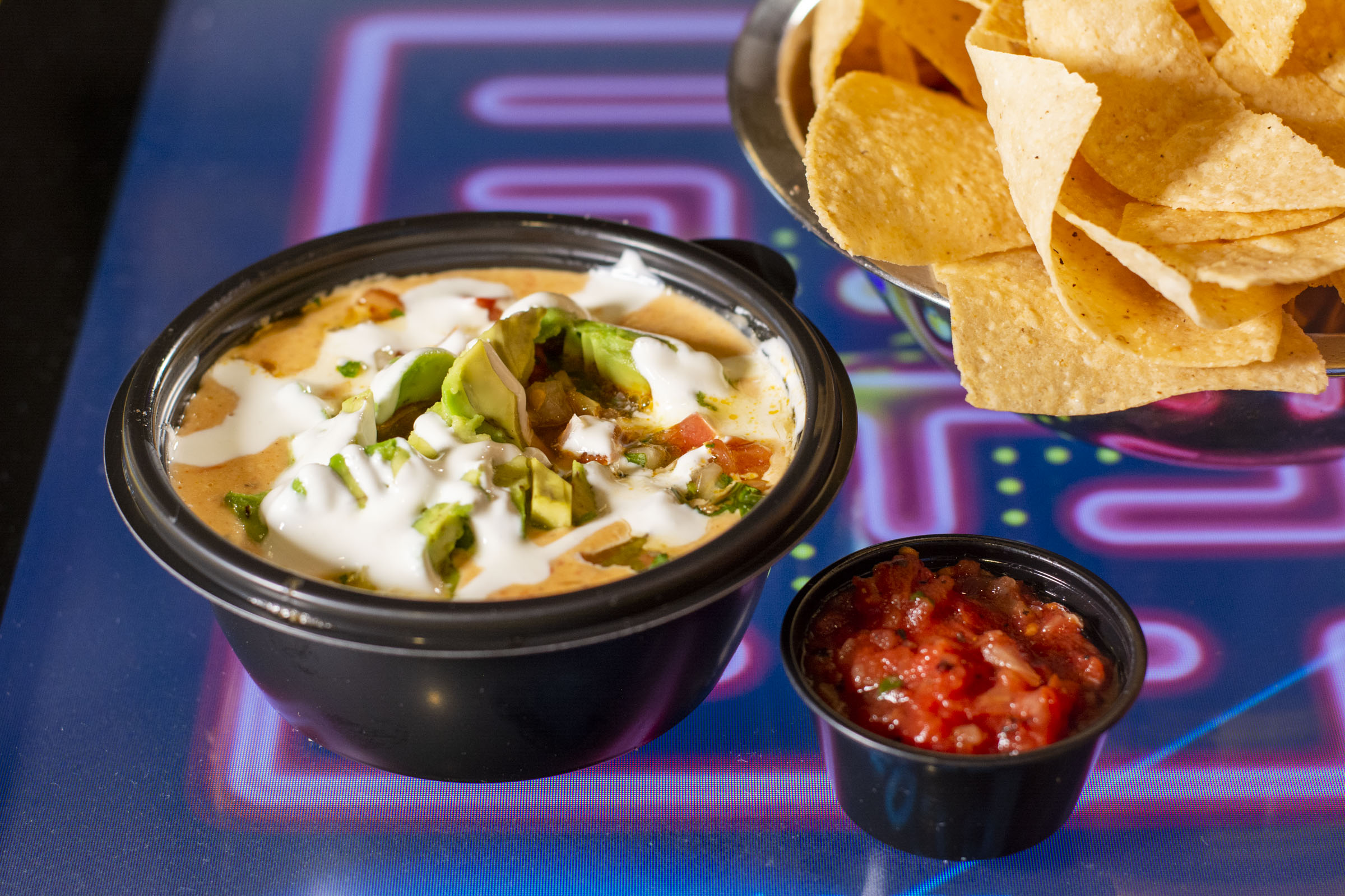 Order Loaded Queso food online from The Garage store, Denton on bringmethat.com