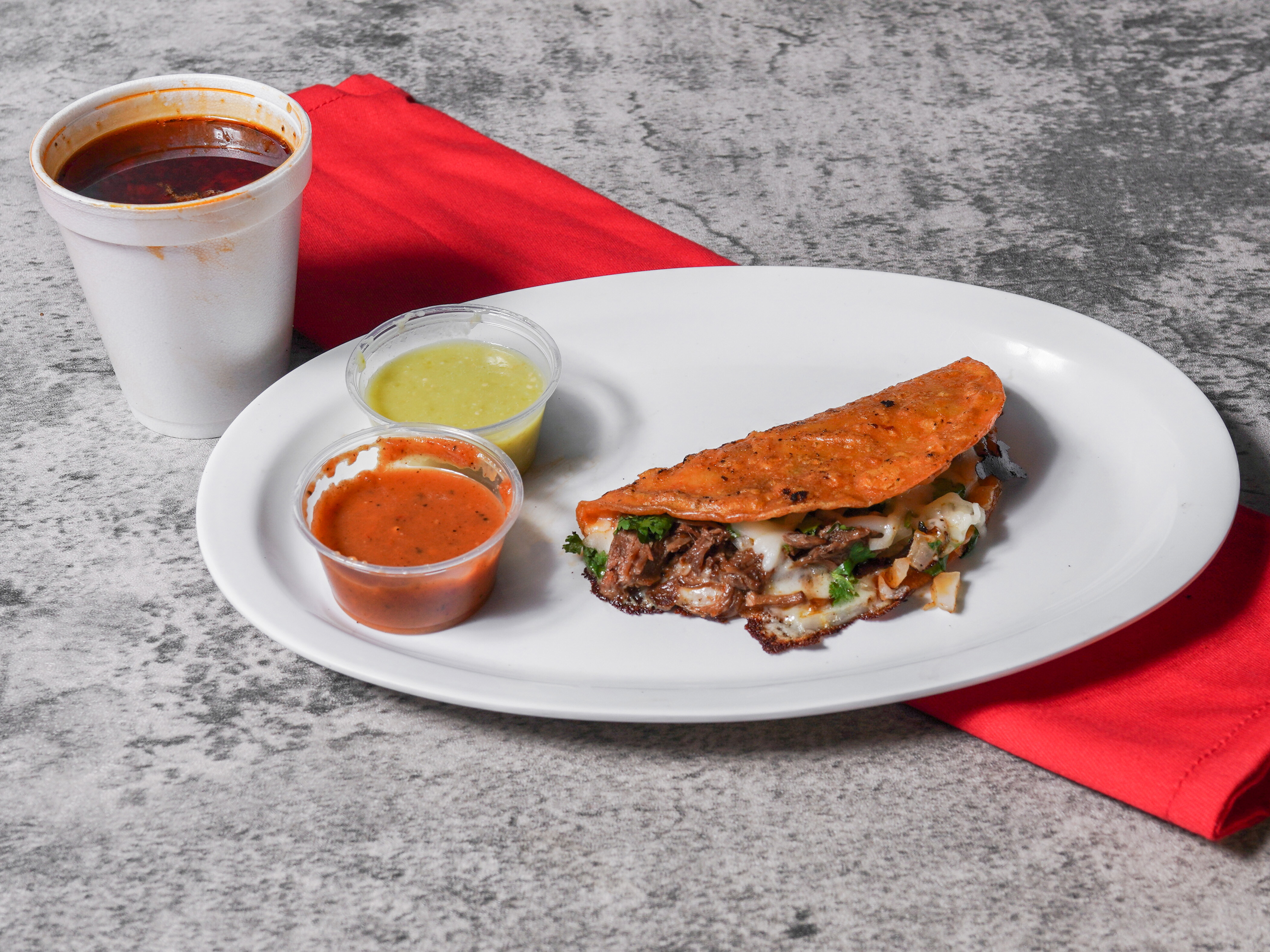 Order Birria queso Taco food online from Chew On This Co. store, Chicago on bringmethat.com