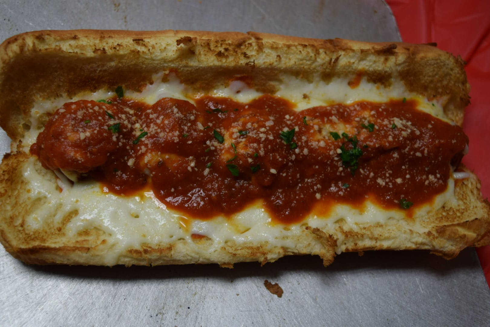 Order Meatball Sub - Half food online from Pizza Parlor store, Pearland on bringmethat.com