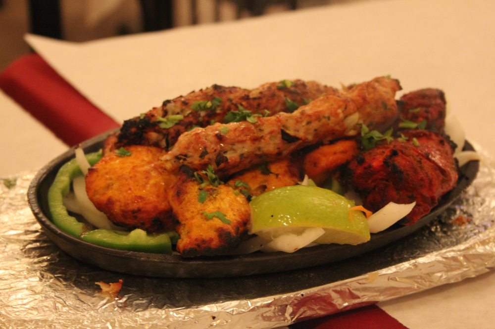 Order MIX GRILL with Nan,Raitha and chutnies food online from Southern Spice store, New Hyde Park on bringmethat.com