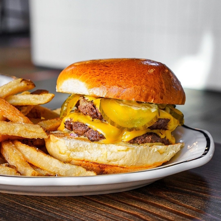 Order Brunch Burger food online from Dooby's store, Baltimore on bringmethat.com