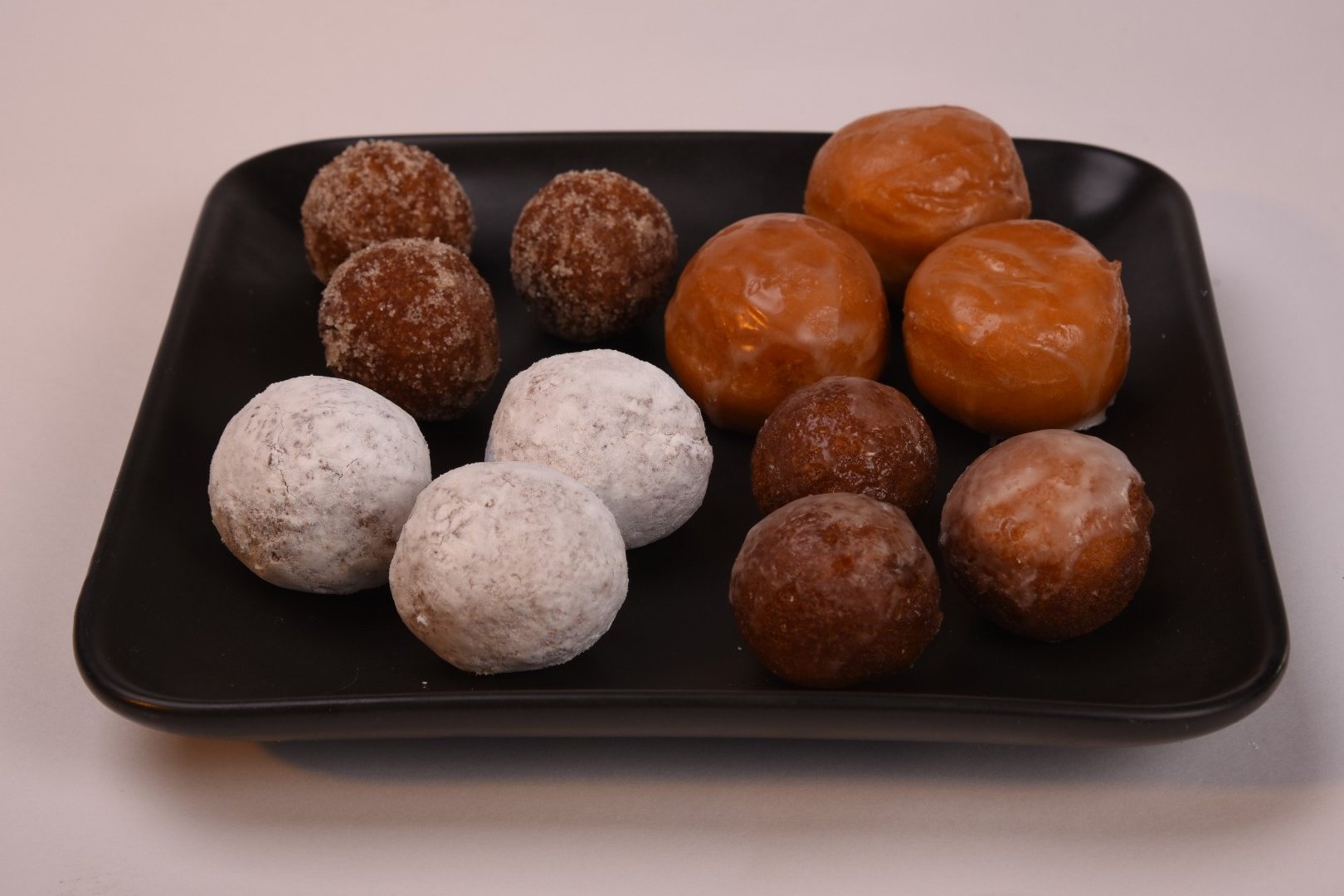 Order Dozen Warm Donut Holes food online from Amigos/Kings Classic store, Lincoln on bringmethat.com