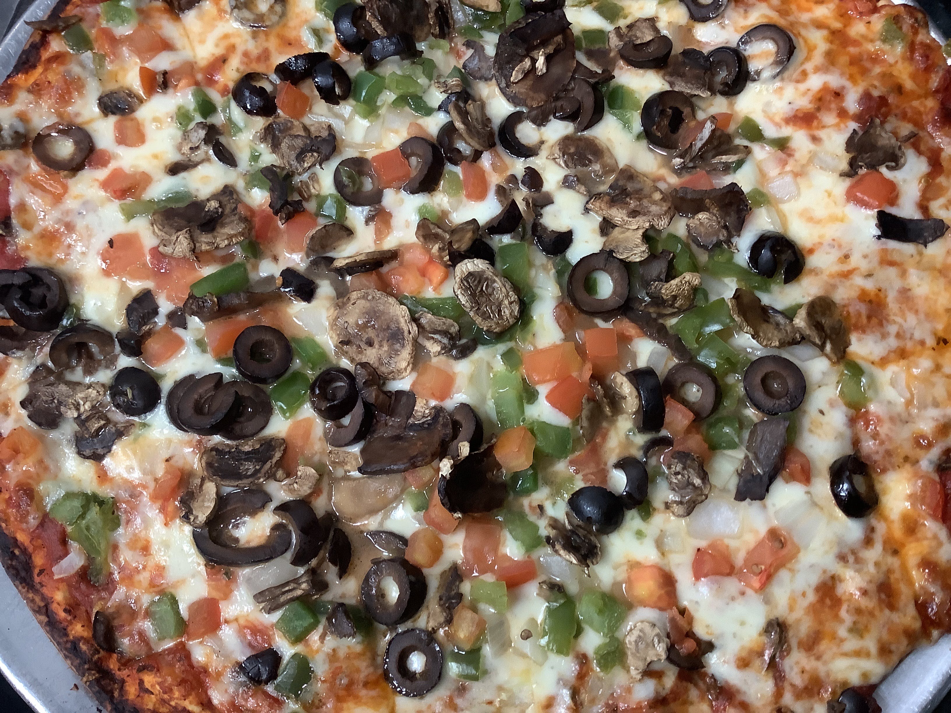 Order Veggie Special Pizza - X-Small 10'' food online from Pizza Garden store, Manitowoc on bringmethat.com