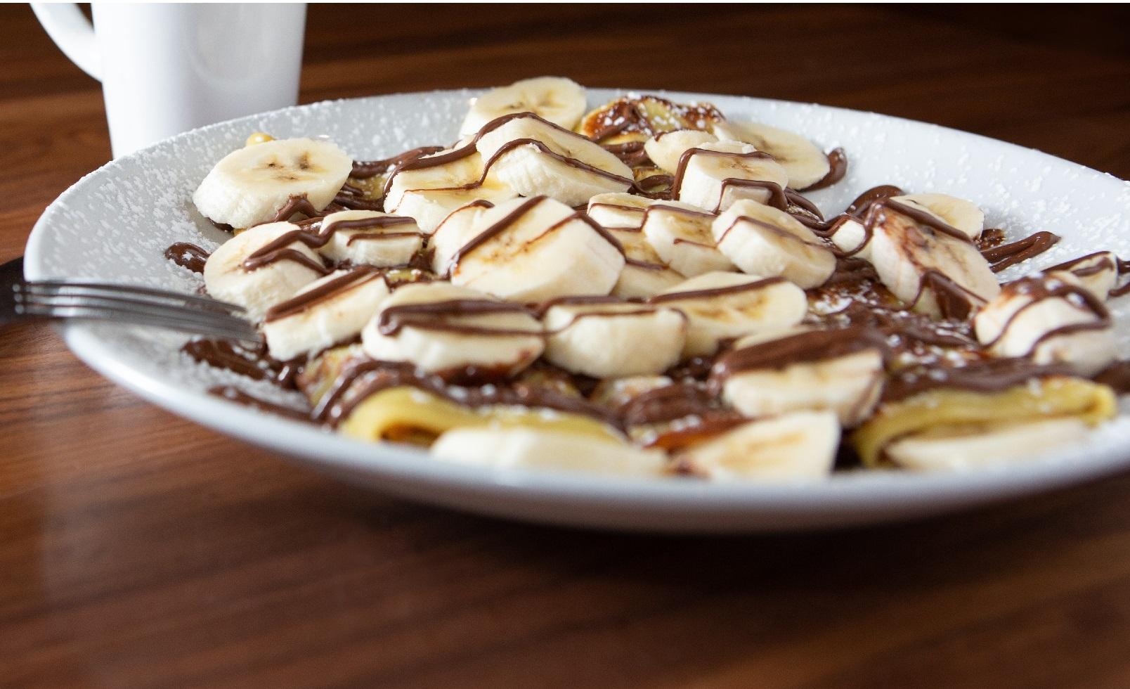 Order Creamy Nutella Crepes food online from Wildberry Pancakes & Cafe store, Libertyville on bringmethat.com