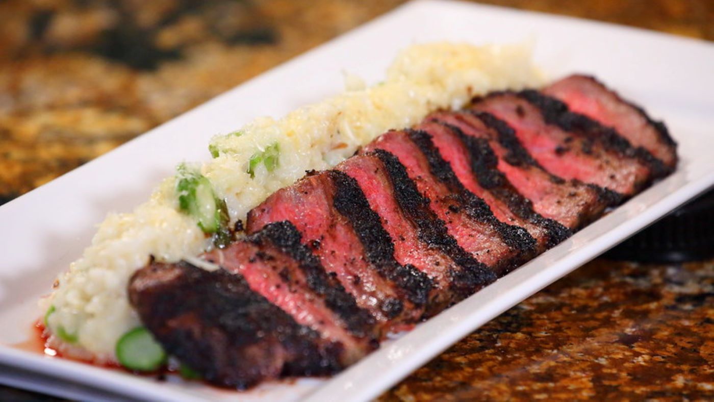 Order Flank Steak with Risotto food online from Skipolini Pizza store, Folsom on bringmethat.com