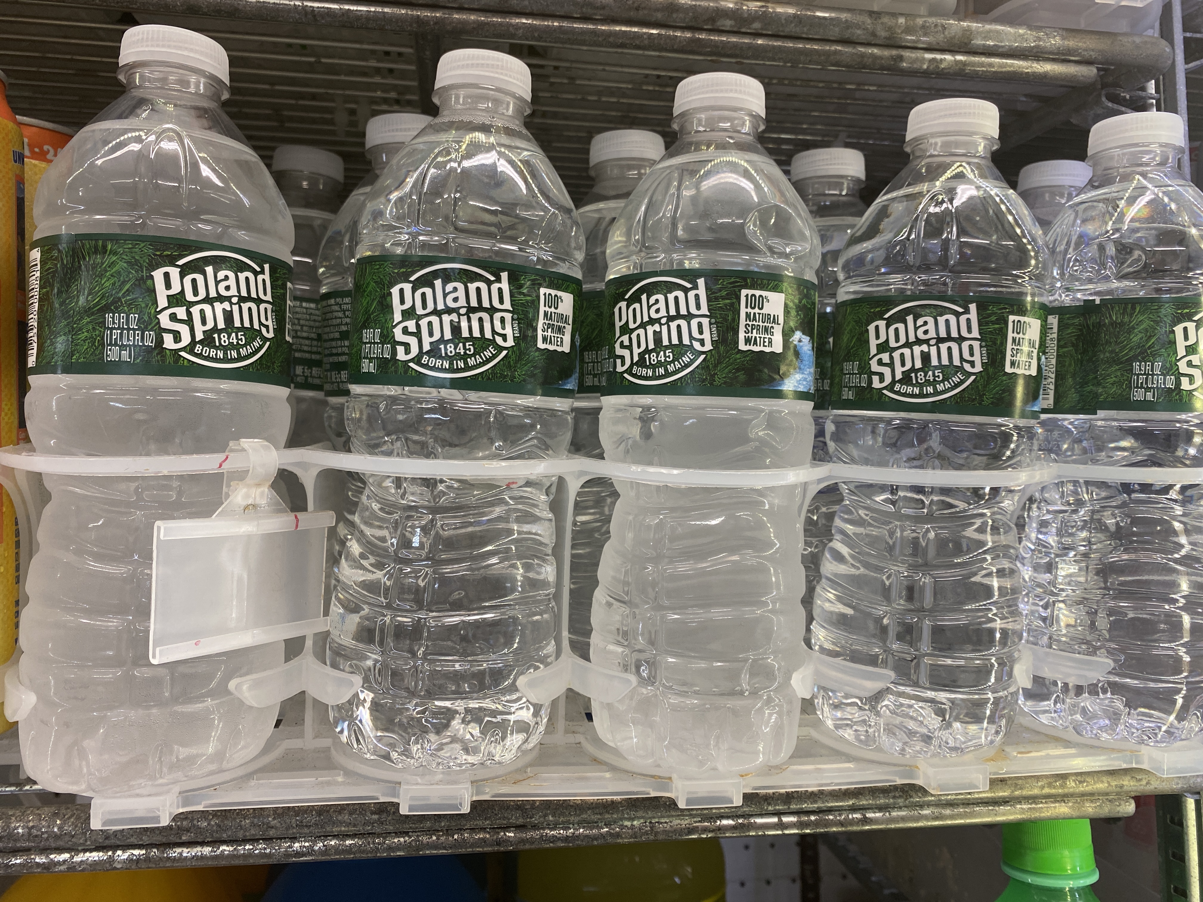 Order Poland Spring Bottled Water food online from Central Deli And Grocery store, Albany on bringmethat.com