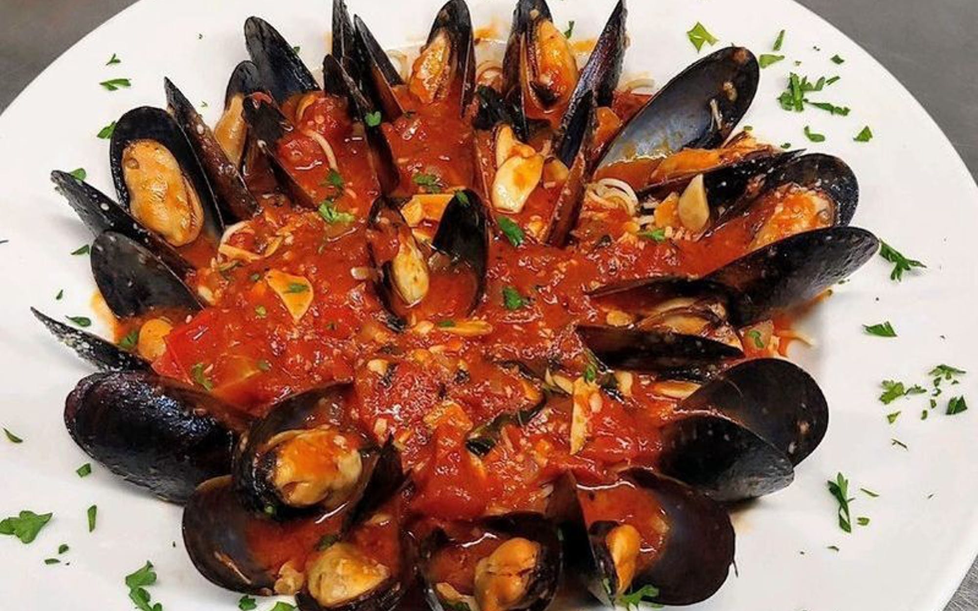 Order Mussel Marinara over Linguini - Entree food online from Pino's Pizzeria store, Easton on bringmethat.com