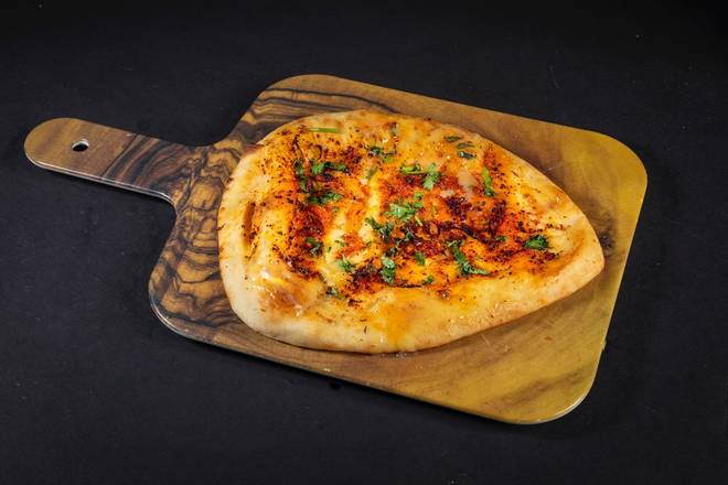 Order Burnt Garlic Chili Kulcha Naan food online from Curry Up Now store, Decatur on bringmethat.com